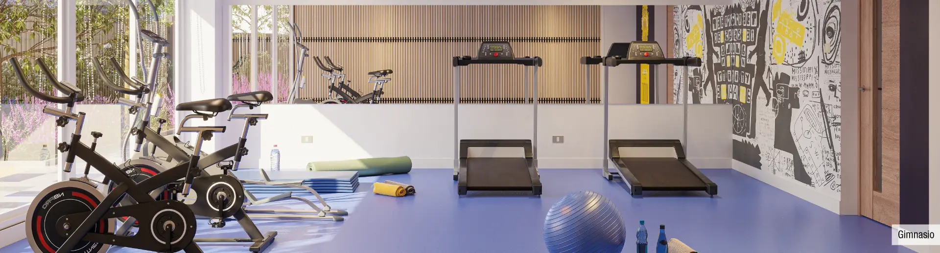 Gimnasio equipado de Edificio Santa Corina en La Cisterna, mostrando modernas máquinas de ejercicio.