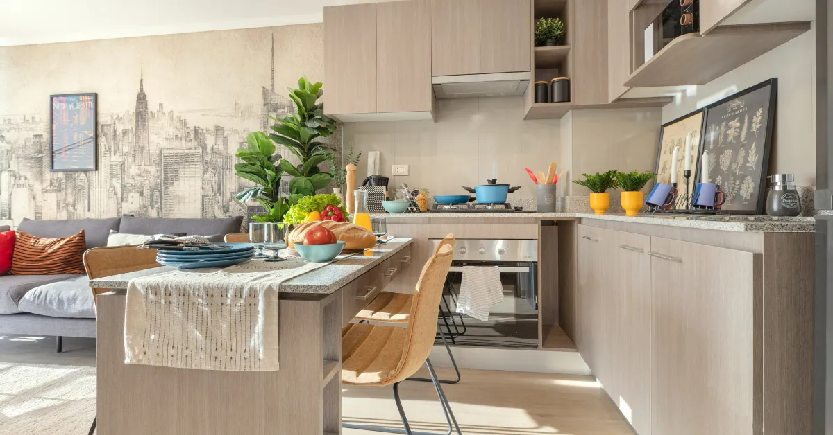 Moderna cocina con horno eléctrico y cubierta de granito en Edificio Briones Luco, La Cisterna.