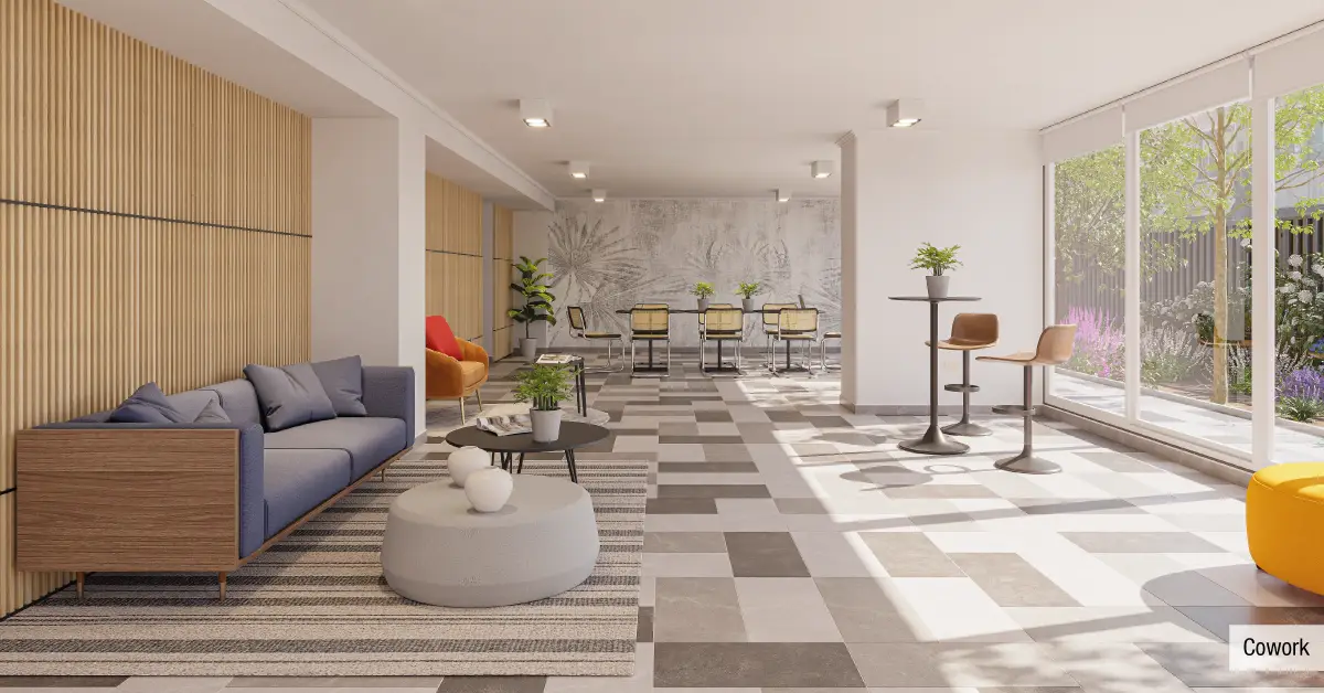 Sector Cowork en Edificio Santa Corina, La Cisterna, mostrando áreas de trabajo y moderna decoración.