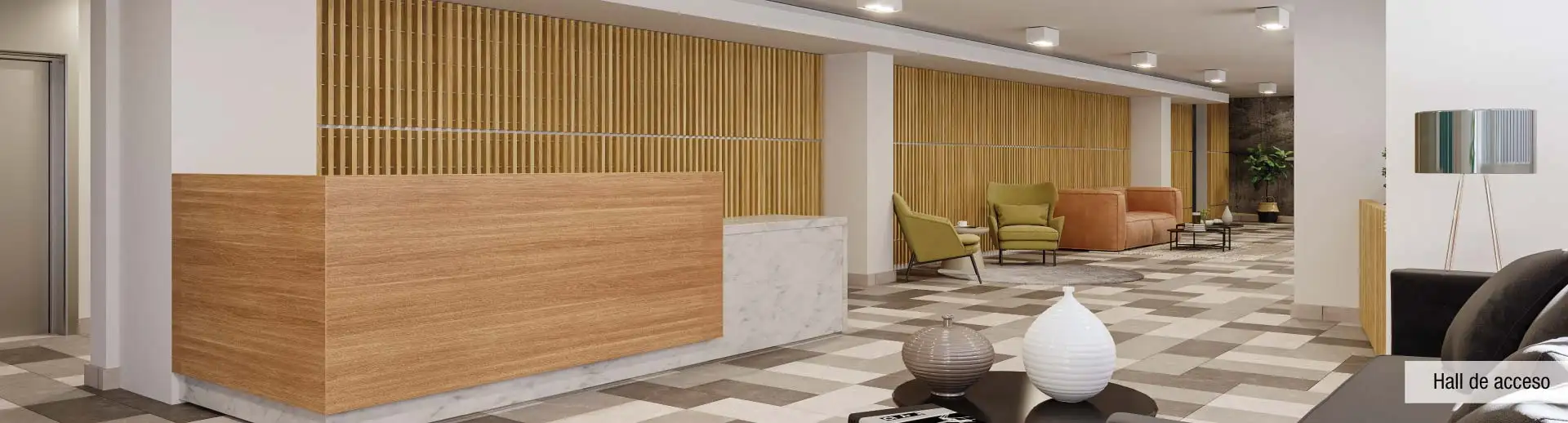 Hall de acceso de Edificio Pedro de la Barra en Santiago Centro, destacando su diseño y arquitectura de vanguardia.