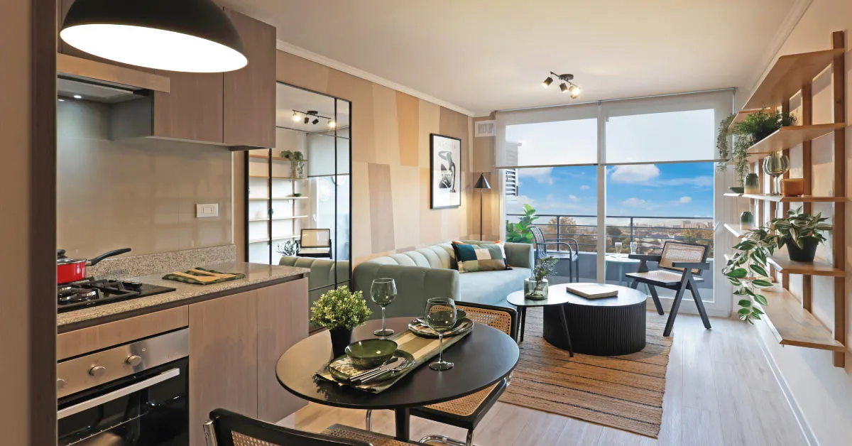 Cocina y living de Edificio Pedro de la Barra en Santiago Centro, destacando su piso vinílico SPC.