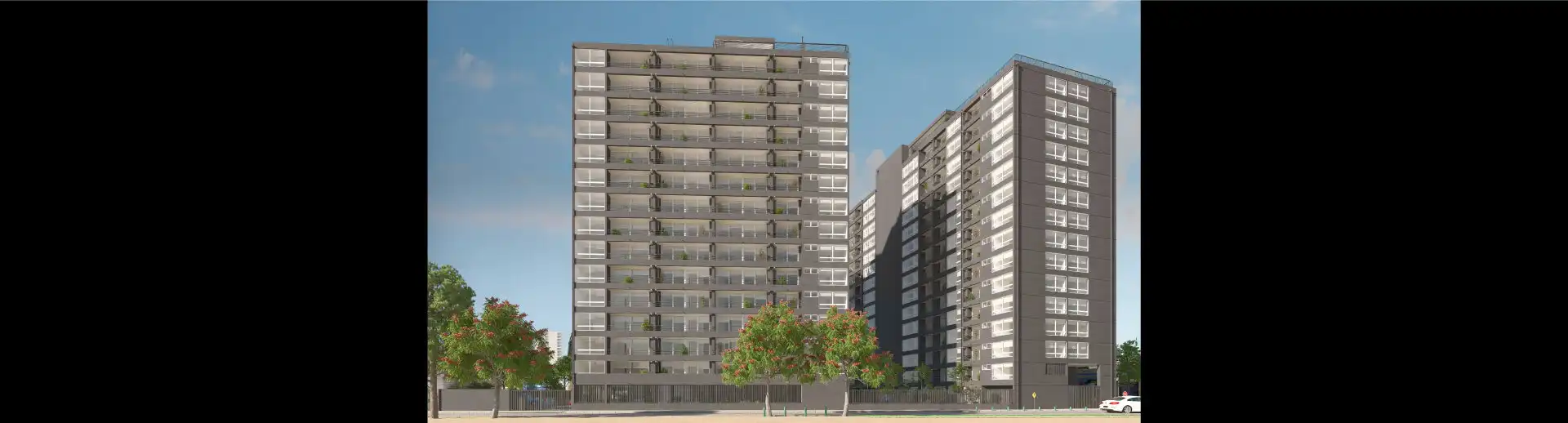 Moderna fachada de los 2 edificios de solo 15 pisos del Condominio Francisco Zelada en Estación Central.
