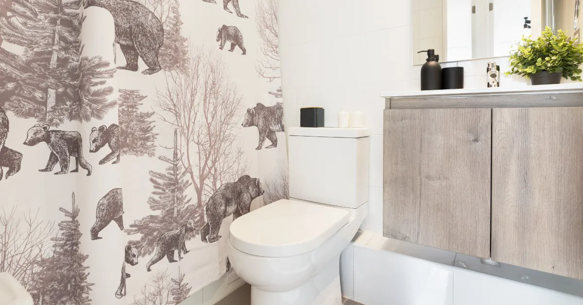 Baño piloto en Edificio Briones Luco, La Cisterna, con vanitorio de loza vítrea y piso porcelánico.
