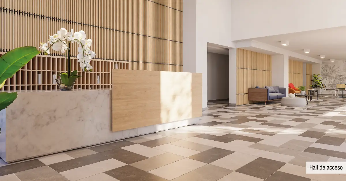 Hall de acceso de Edificio Santa Corina en La Cisterna, destacando recepción y conserjería 24 horas.