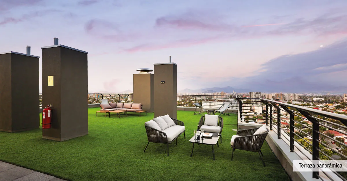 Terraza en cubierta de Condominio Parque del Sur, La Cisterna, con vista panorámica al atardecer.