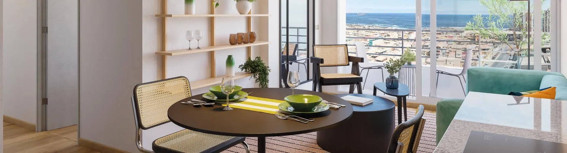 Comedor de Condominio Trocadero en Antofagasta, mostrando su piso vinílico SPC y balcón con gres porcelánico.